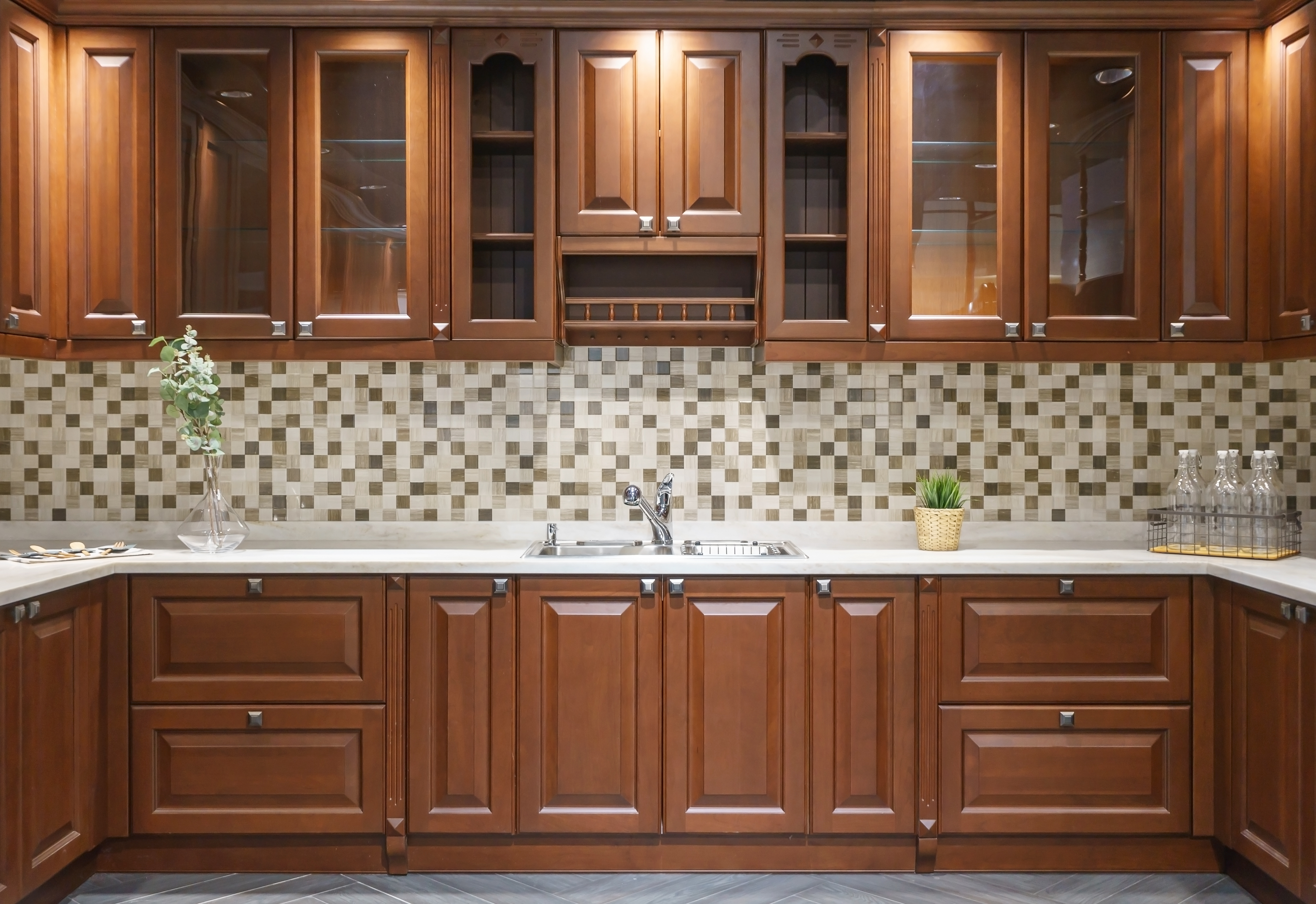 Wood counters and floors with tile backsplash in modern kitchen