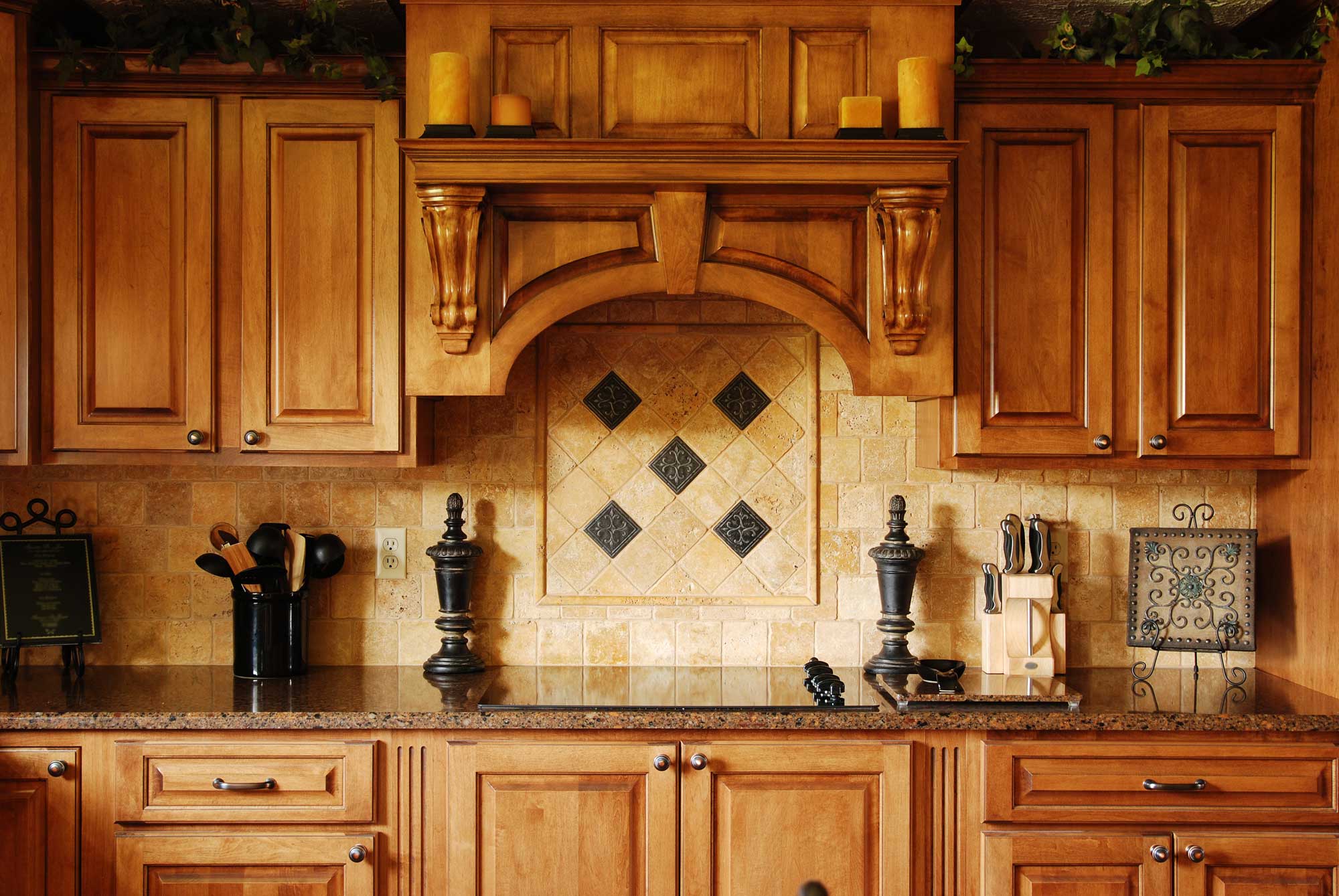 Custom kitchen with wood cabinets and tile backsplash